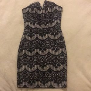 Black and cream colored dress